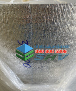 Cuộn vật liệu cách âm cách nhiệt màu bạc, có logo và số điện thoại in trên bề mặt.